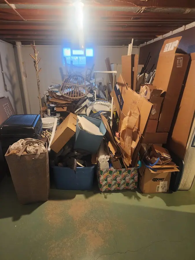 Roll-off dumpster container at job site for 2 Yard Dumpster Rental in Valrico